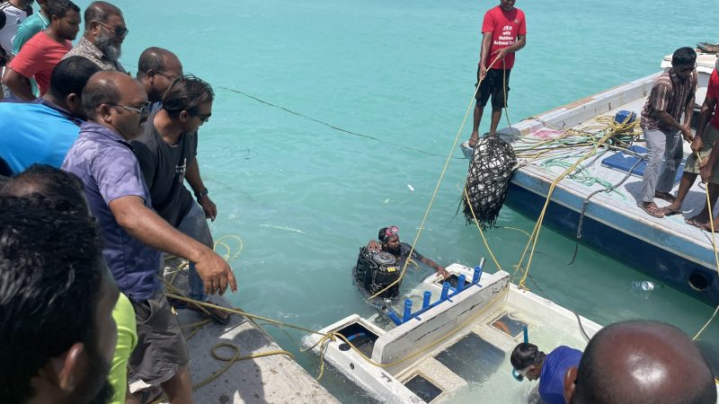 A Dinghy capsized on HDh. Kumundhoo Harbour Channel