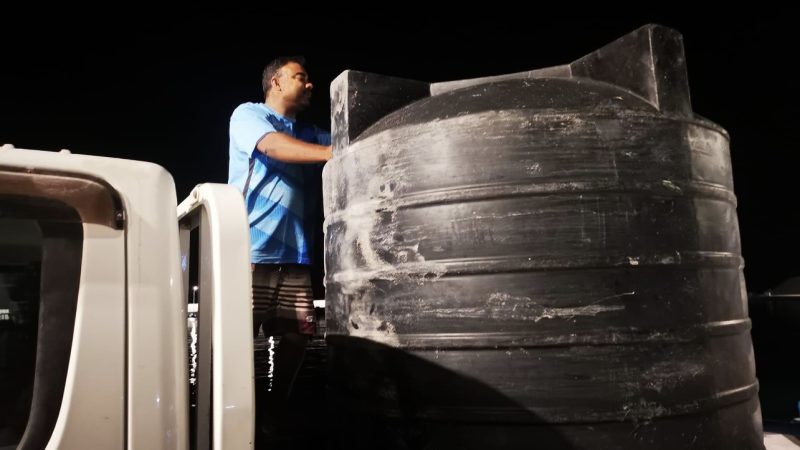 Water sprayed to the roads of Ha. Ihavandhoo to combat dust due to droughts